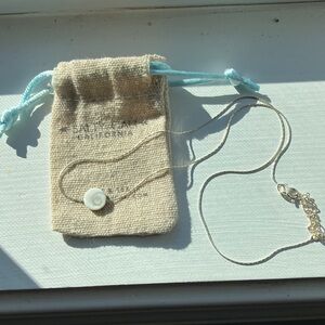 Elegant Silver Necklace with White Pendant